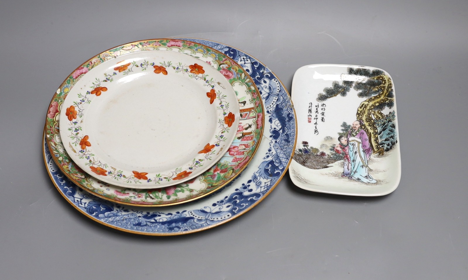 Four 18th / 19th century Chinese plates, and a later dish, largest plate 29cms diameter